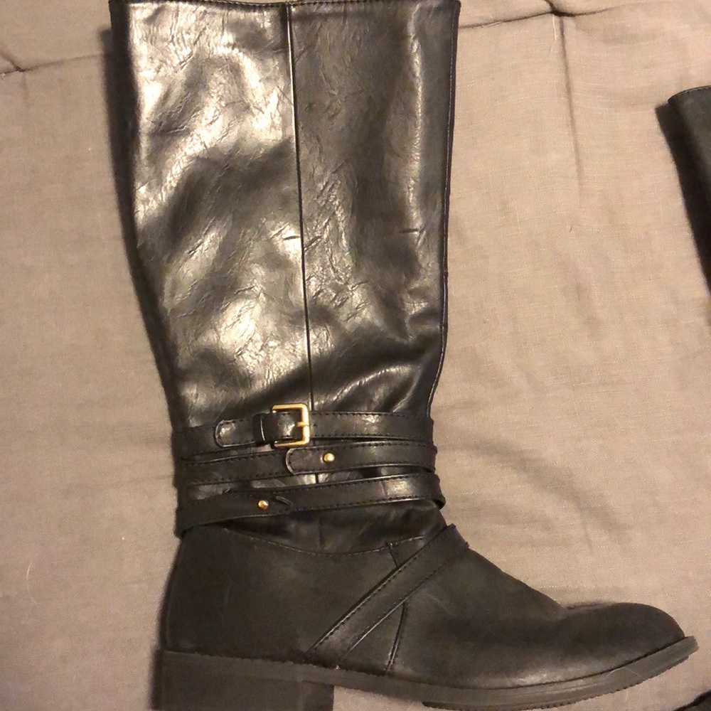 Below the knee tall black boots
